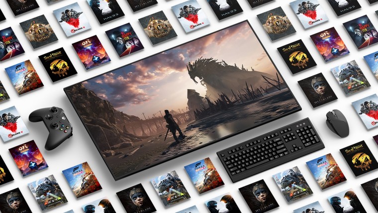 A screen with a game and numerous game covers around it