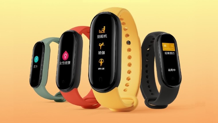 Xiaomi Mi Bands on an orange and yellow background
