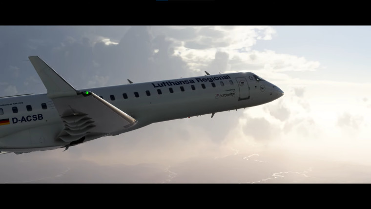 The Aerosoft CRJ 550700 flying in the air with the white sky behind it