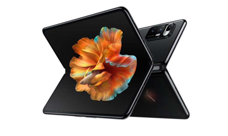 Front design of Xiaomi&039s Mi Mix Fold smartphone sitting horizontally against the back of another