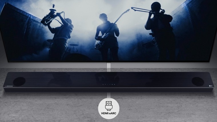 LG 2021 soundbar under a TV with an HDMI eARC indicator