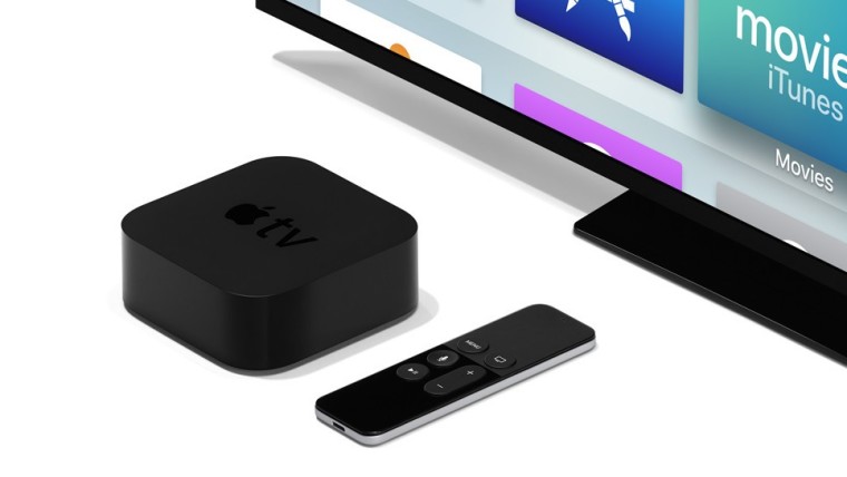 Apple TV set-top box and its remote in front of a TV