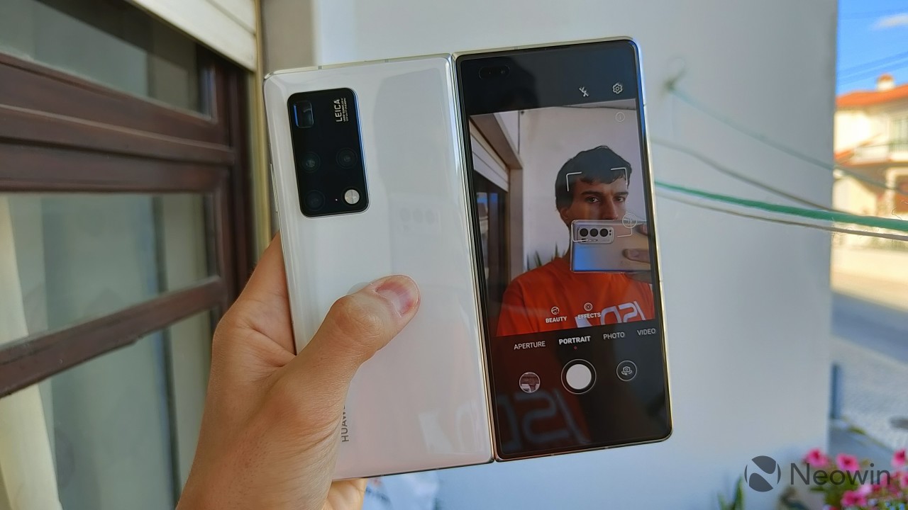 Huawei Mate X2 being used to take a selfie with the main camera and the cover display