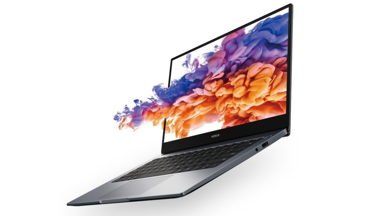 An Honor MagicBook laptop displaying colorful smoke which shoots out of the screen