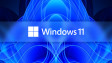 Windows 11 logo white on top of a fractal variant of the Windows 11 default wallpaper