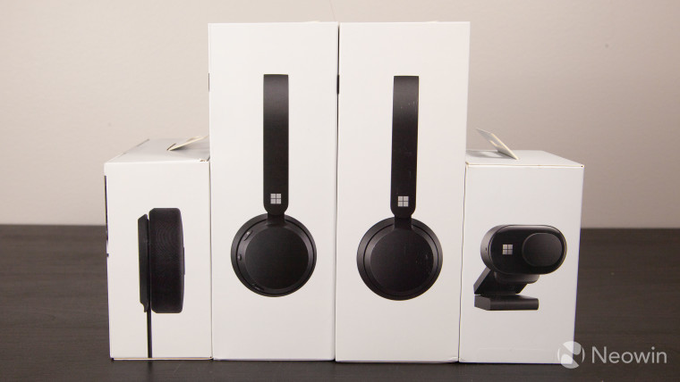 Boxes of the Microsoft Modern accessories including USB headset wireless headset webcam and speaker