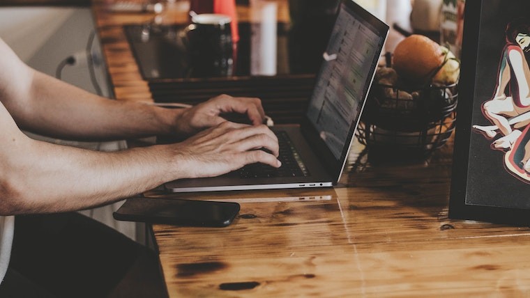 Someone using a laptop